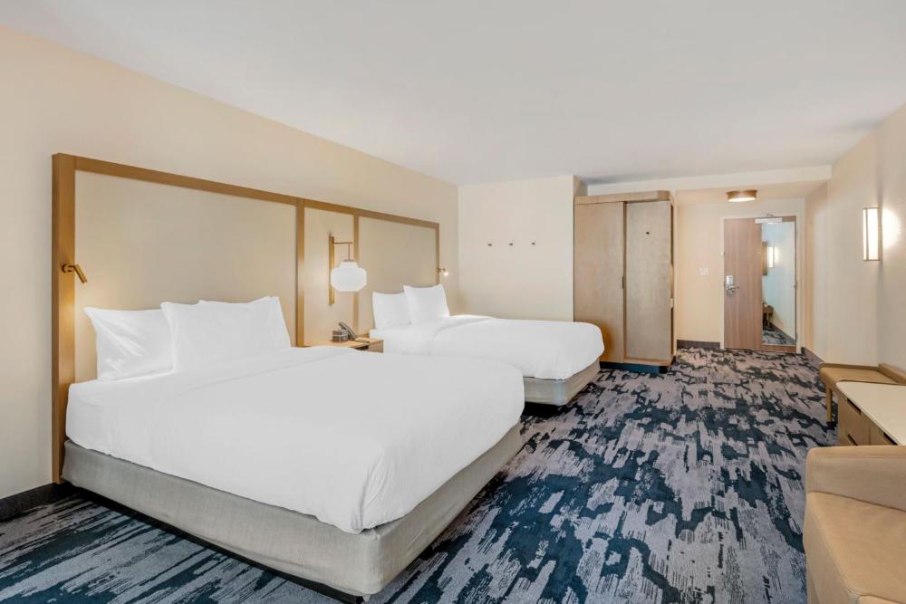 Queen Suite with Two Queen Beds and Sofa Bed interior